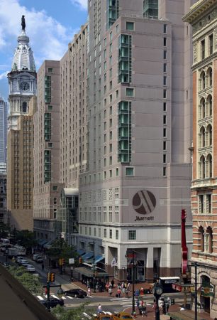 street view of the Philadelphia Marriott Downtown with City Hall tower in the background