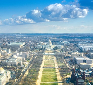 shutterstock image of aerial view of the U.S. capitol and beyond