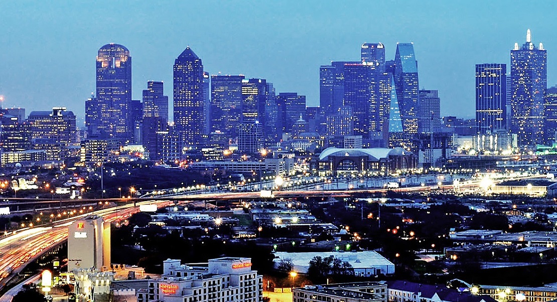 Apartment Construction 2017 - Dallas TX skyline at night Rent Cafe