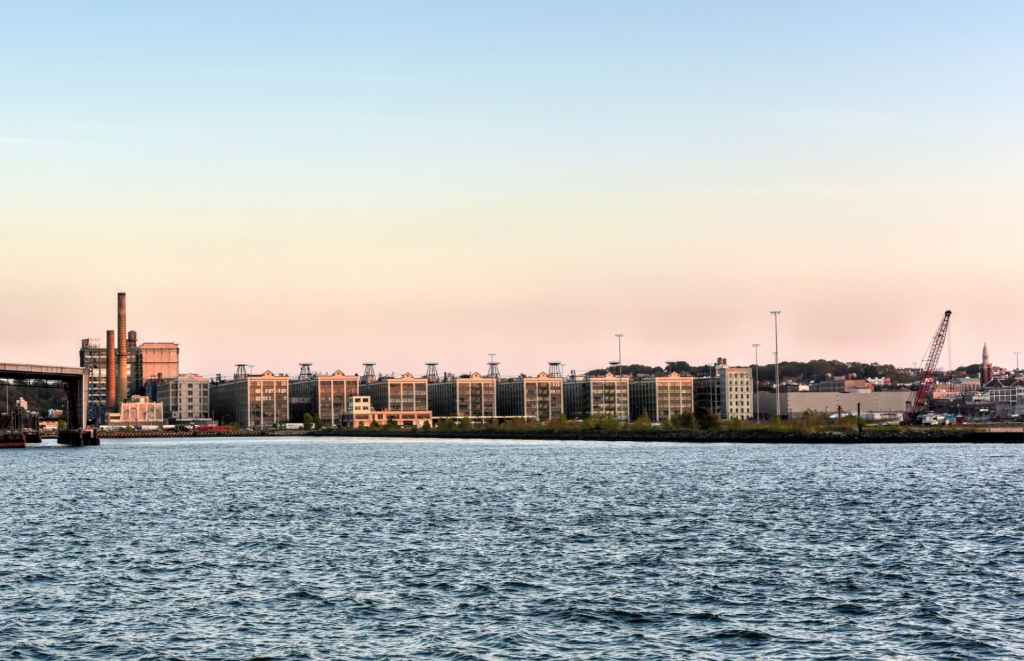 The preferred connectivity partner for the one-of-a-kind Brooklyn campus signed a lease spanning two decades to provide infrastructure, connectivity, colocation, cloud services, and more to the companies at Industry City.