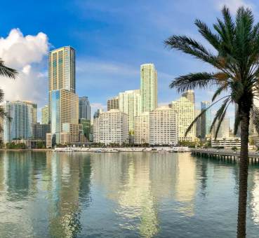 view of the Miami Brickell neighborhood skyline from across the water