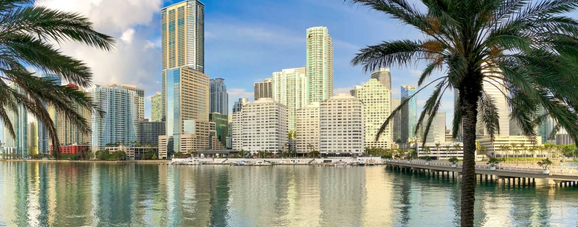 view of the Miami Brickell neighborhood skyline from across the water