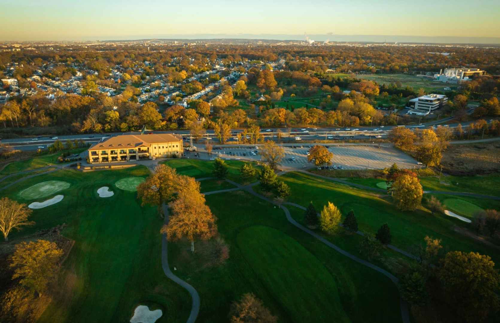 aerial panoramic view of the kenilworth new jersey golf course in the closer plane and the Northeast Science & Technology (NEST) Center (frmerly mercl campus) further back and to the right