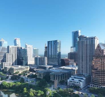 panoramic view of high-rises and skyscrapers in downtown Austin, Texas, on the north shore of the colorado river