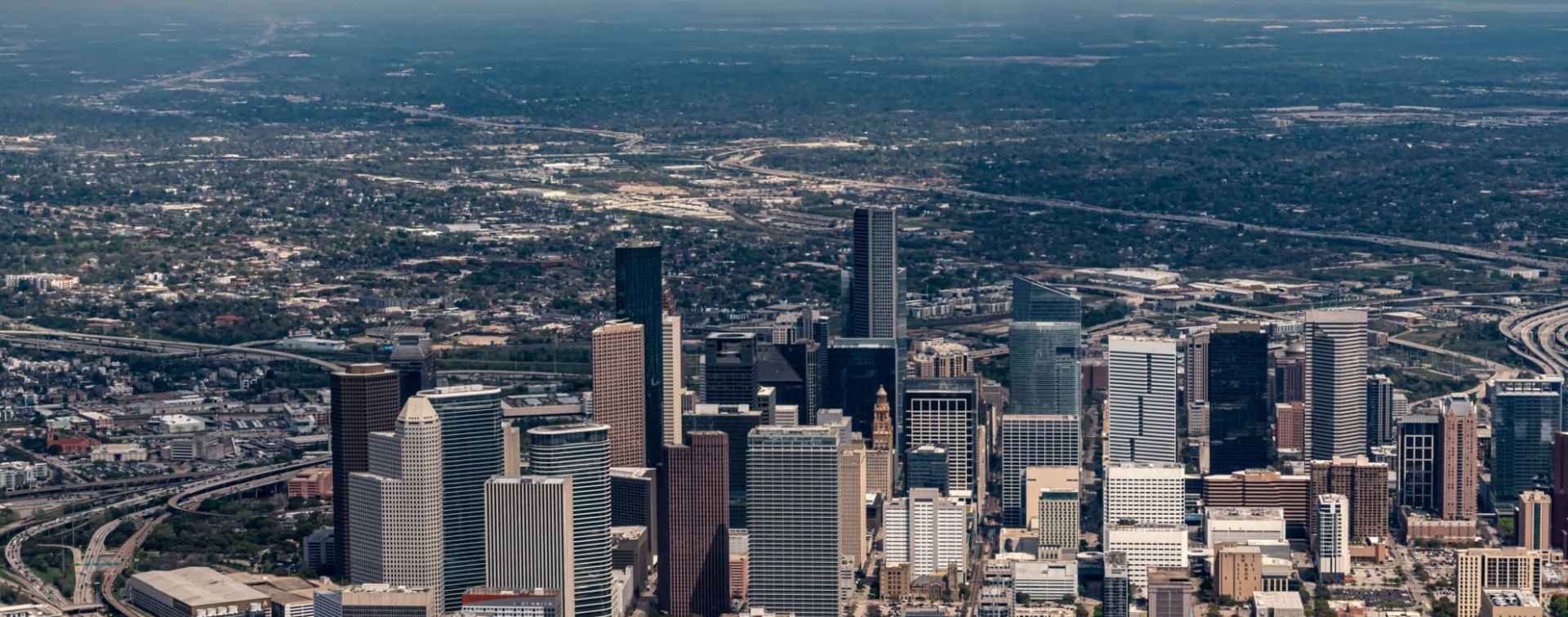 houston aerial panoramic view of the central business district skyscraper skyline and the surrounding urban and suburban areas