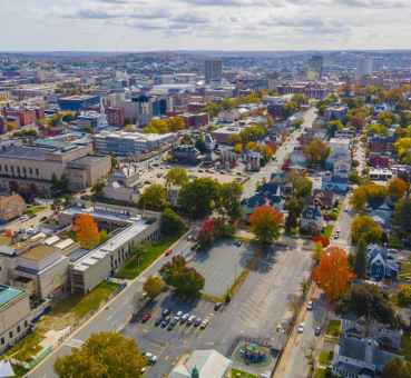 Worcester Massachusetts panoramic aerial view of the historic neighborhoods in the forefront and the central business district in the background