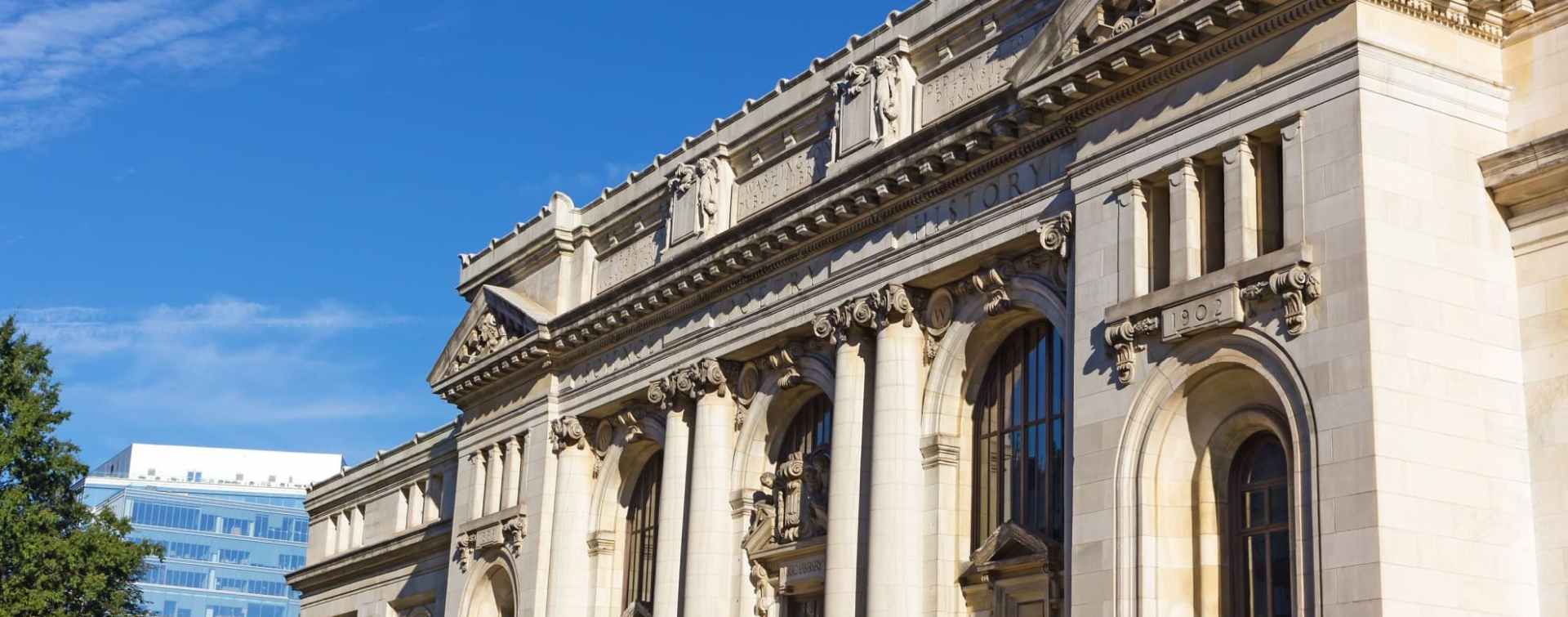 washington dc mt vernon square carnegie library forefront and 901 k street office building background