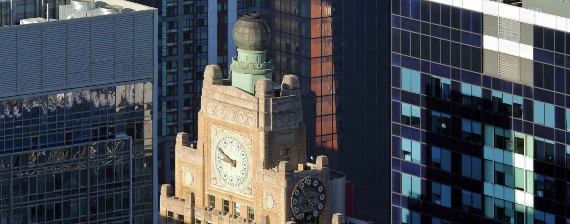 the iconic top of the landmarked art deco and beaux arts Paramount Building in Manhattan