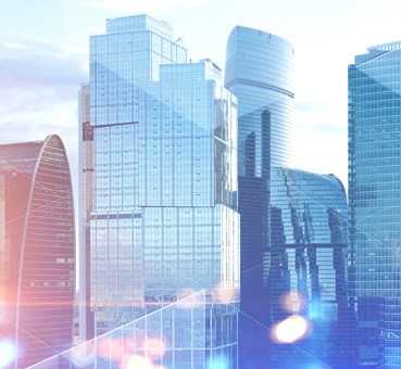 Panoramic view of modern cityscape with skyscrapers and glass towers with double exposure of triangular pattern for expert insights with joe killinger