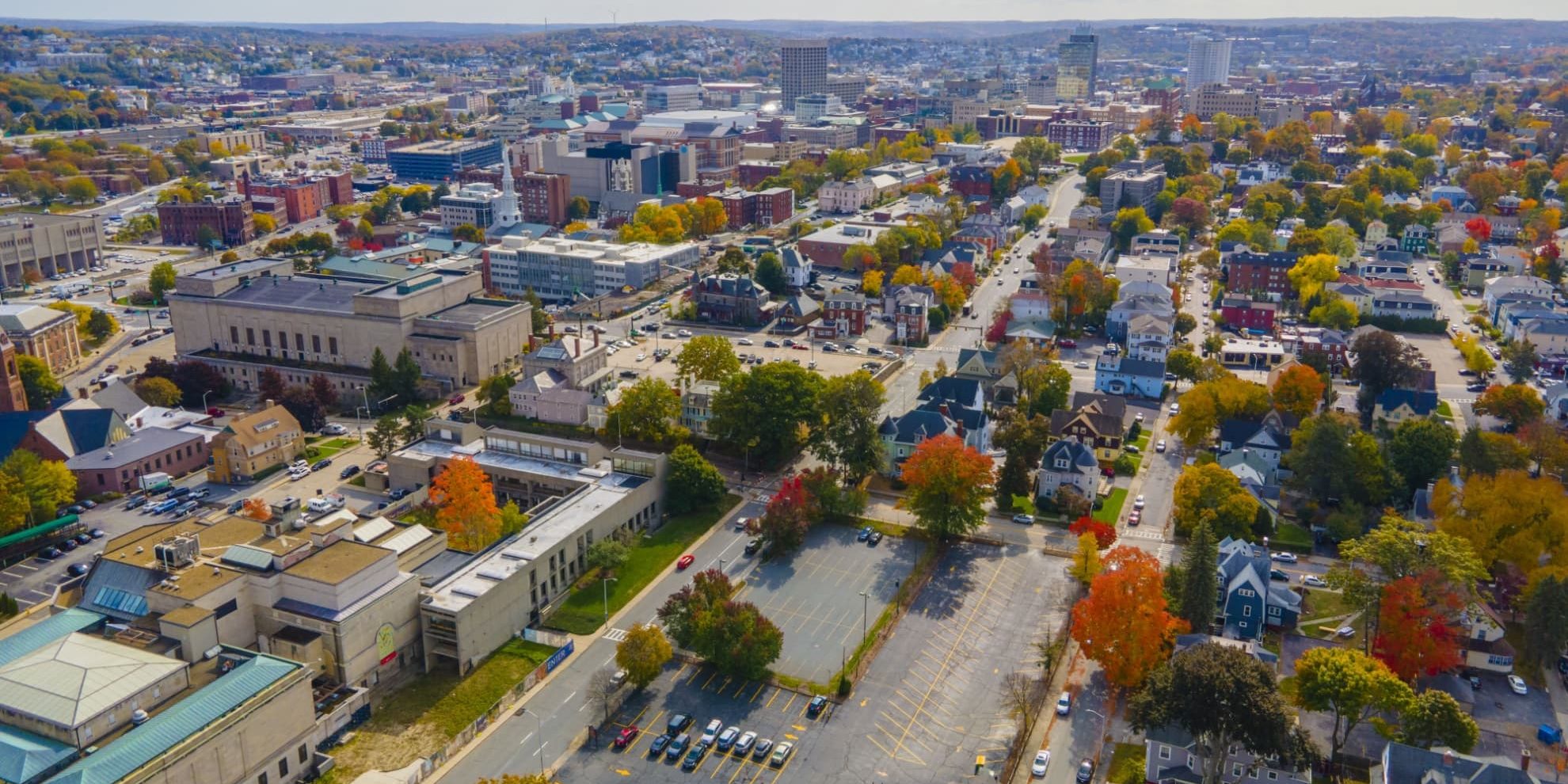 Worcester Massachusetts panoramic aerial view of the historic neighborhoods in the forefront and the central business district in the background