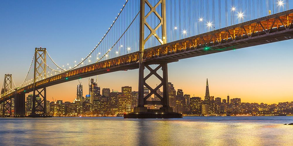 Panoramic view of the Oakland Bridge and the San Francisco skyline