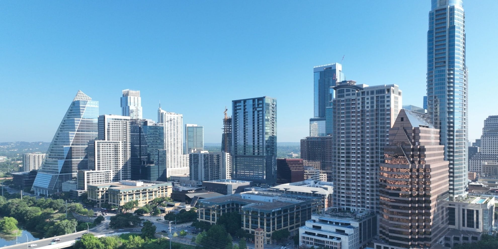 panoramic view of high-rises and skyscrapers in downtown Austin, Texas, on the north shore of the colorado river