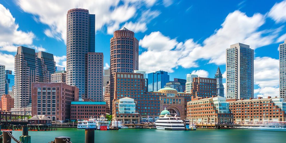 A wide shot of the Boston skyline and waterfront