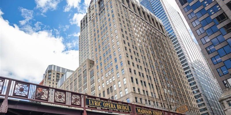chicago civic opera building and lyric opera bridge viewed from the chicago river