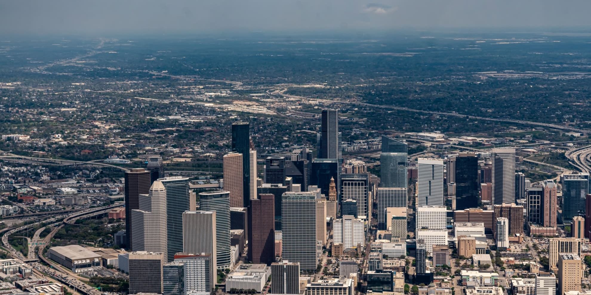 houston aerial panoramic view of the central business district skyscraper skyline and the surrounding urban and suburban areas