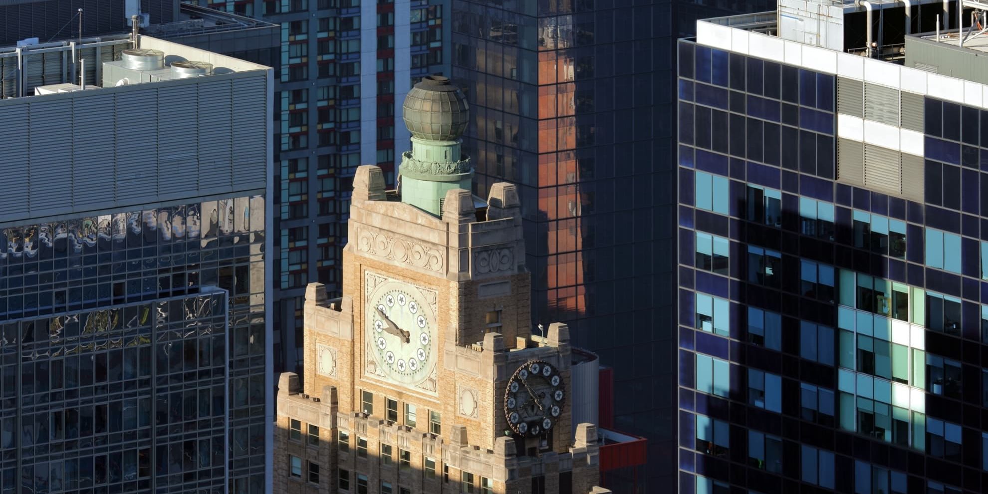 the iconic top of the landmarked art deco and beaux arts Paramount Building in Manhattan