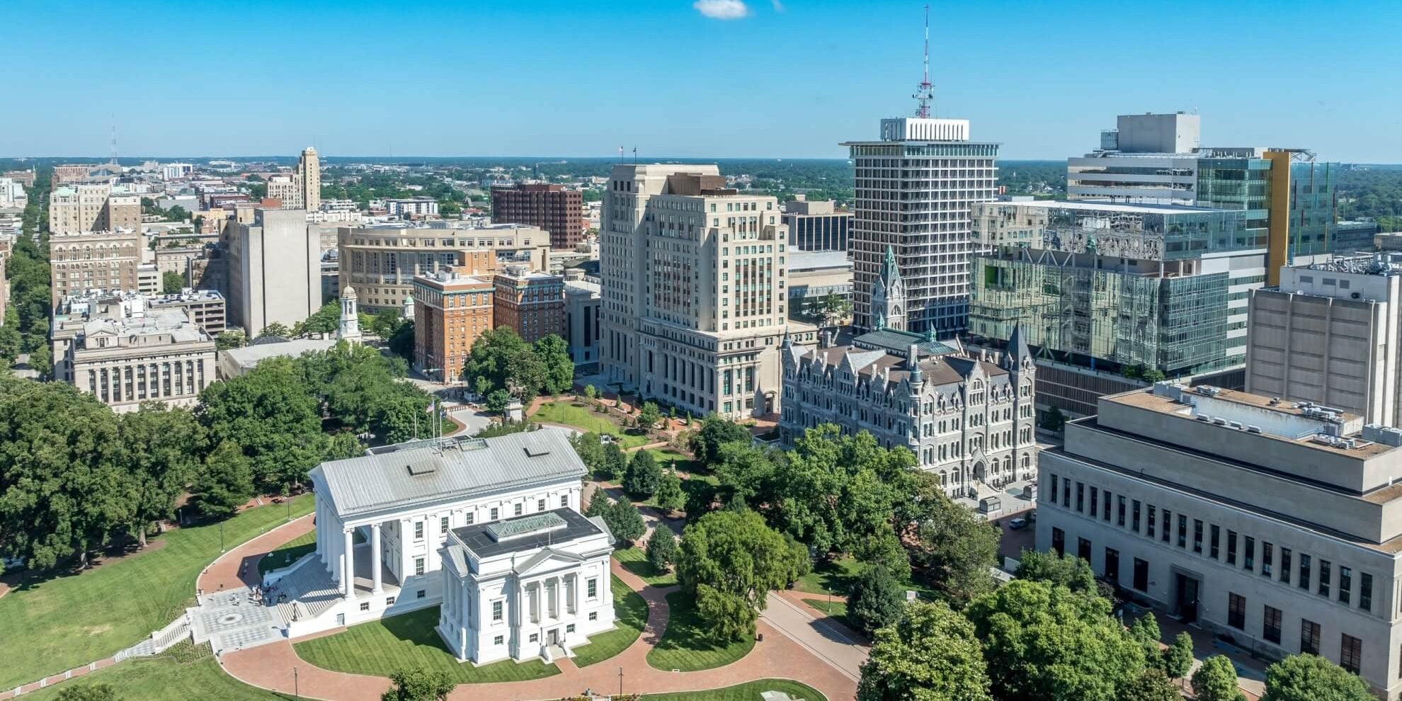 aerial panoramic drone view of commercial real estate buildings in richmond virginia central business district