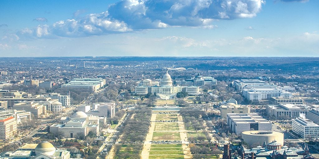shutterstock image of aerial view of the U.S. capitol and beyond