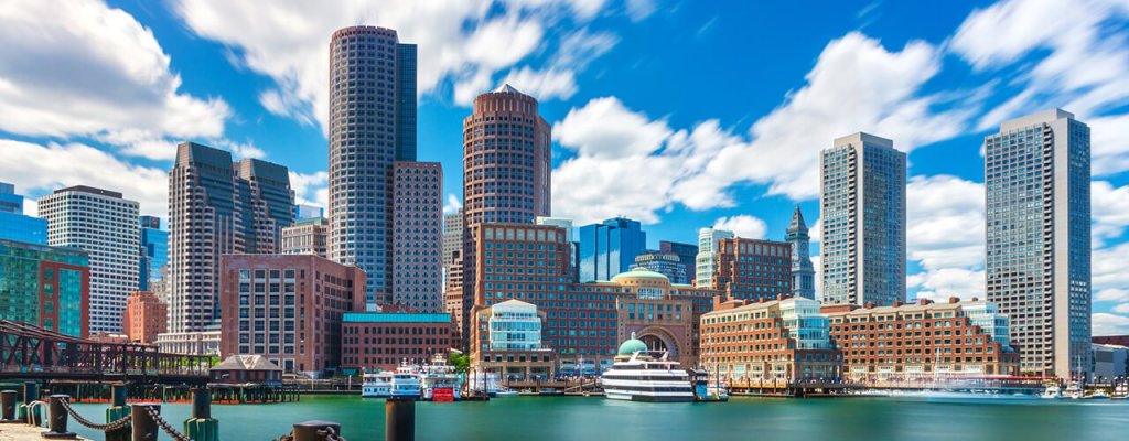 A wide shot of the Boston skyline and waterfront