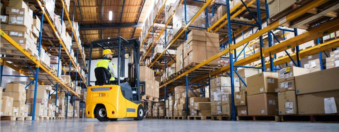 man on forklift in a warehouse